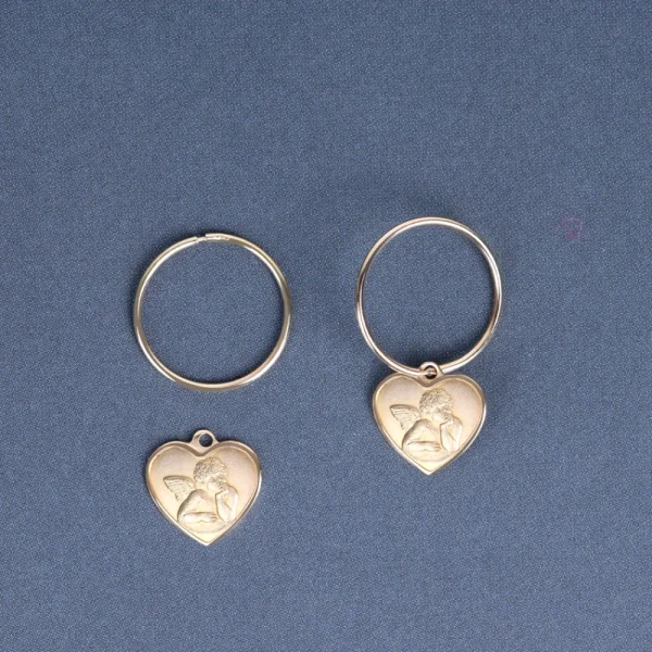 Fashion L’angelo contemplatore. Hoop earring Earrings